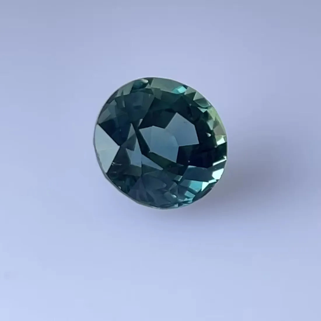 2.55ct Round Natural Sapphire (Colour Multicolor, Clarity Slightly Included, Cut Faceted)