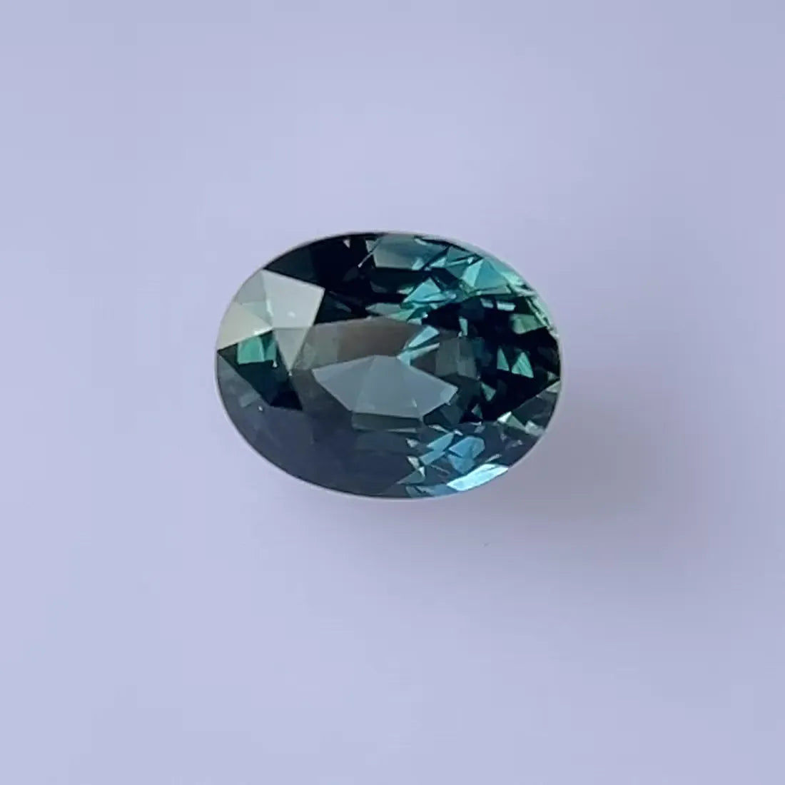 1.57ct Oval Natural Sapphire (Colour Multicolor, Clarity Slightly Included, Cut Faceted)