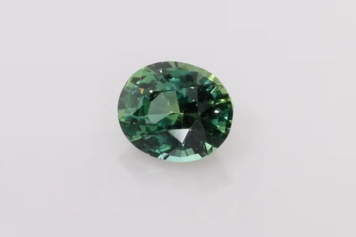 1.57ct Oval Natural Sapphire (Colour Multicolor, Clarity Slightly Included, Cut Faceted)