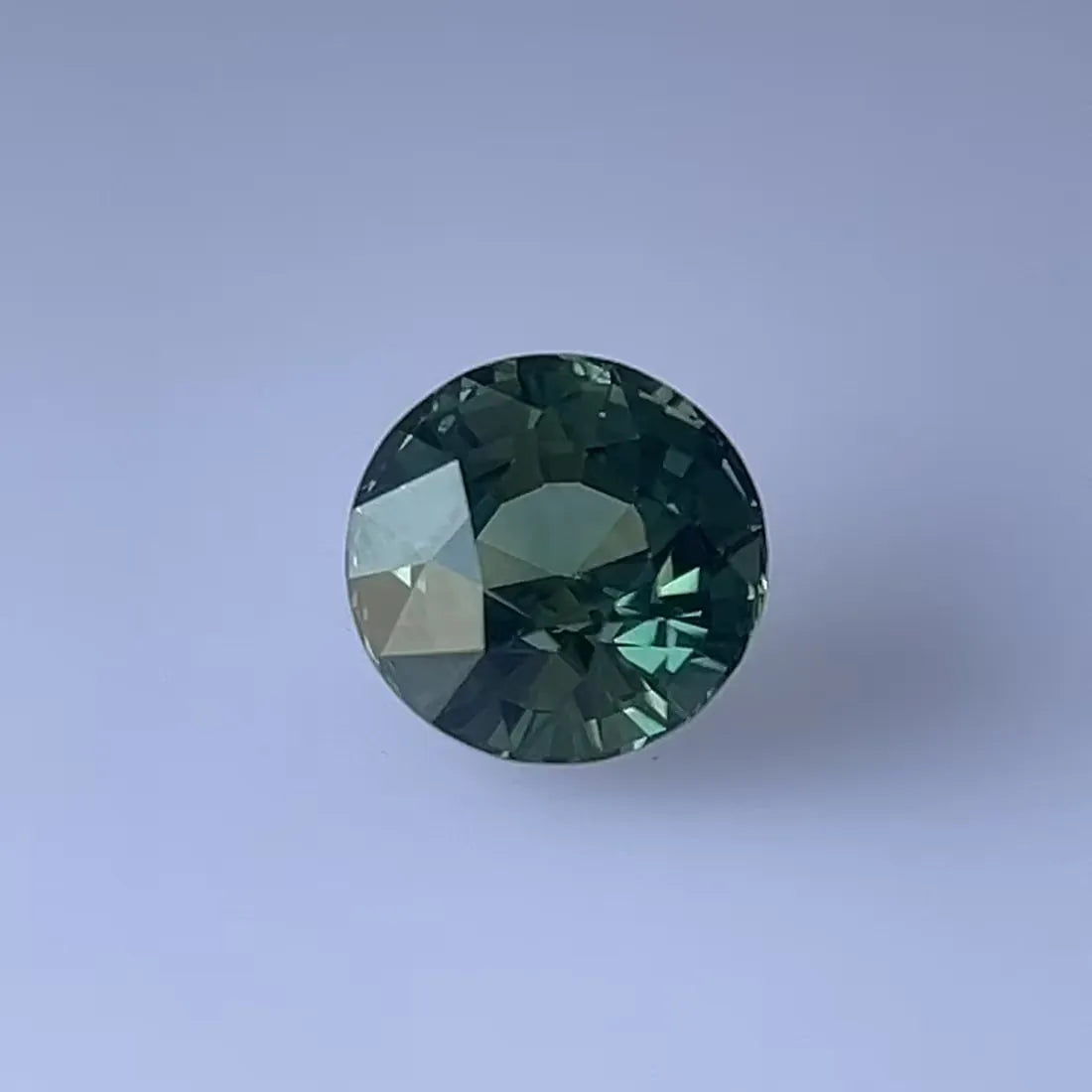 2.07ct Round Natural Sapphire (Colour Multicolor, Clarity Slightly Included, Cut Faceted)