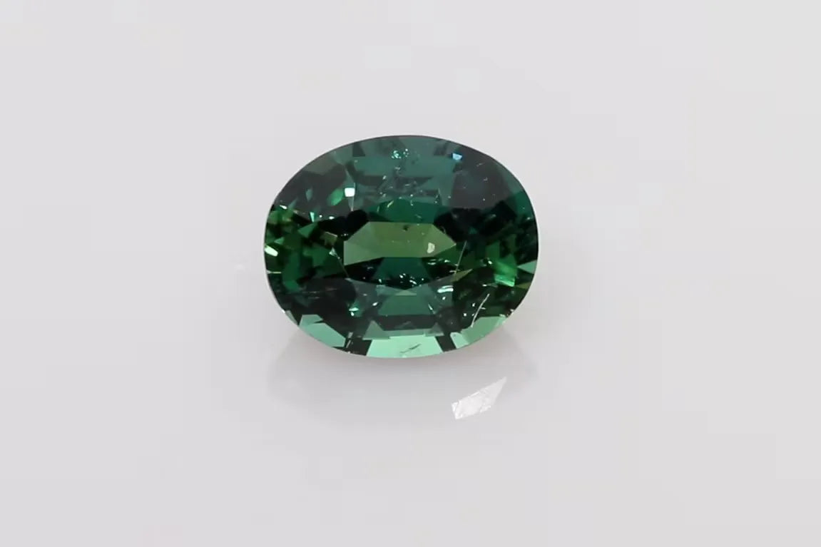 1.57ct Oval Natural Sapphire (Colour Multicolor, Clarity Slightly Included, Cut Faceted)