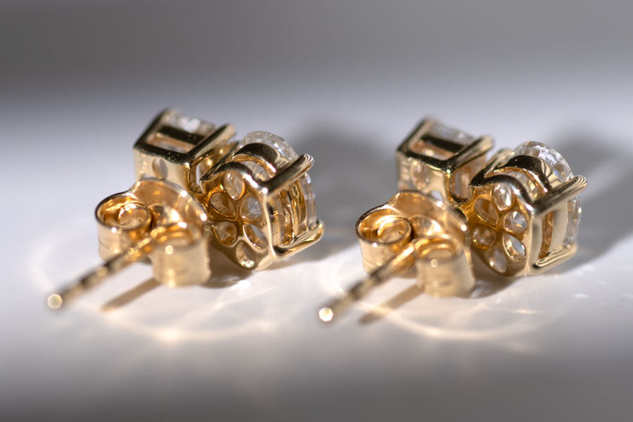 Toi et Moi studs 2.05 ctw Oval and Emerald Lab Grown Diamond, Set in a 14k Yellow Gold Setting