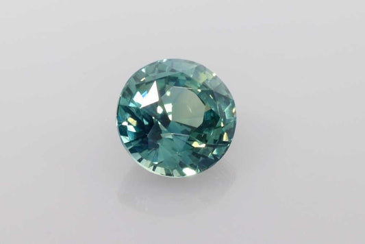 1.54ct Round Natural Sapphire (Colour Multicolor, Clarity Slightly Included, Cut Faceted)