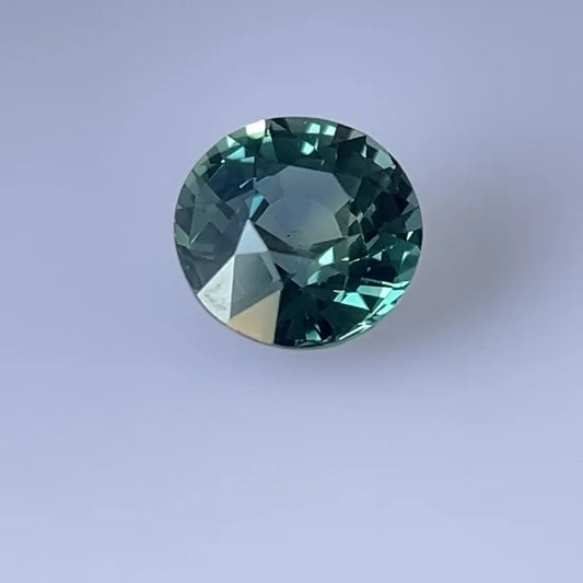 2.19ct Round Natural Sapphire (Colour Multicolor, Clarity Slightly Included, Cut Faceted)