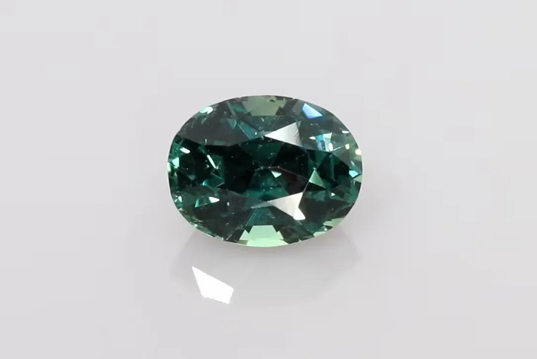 1.76ct Oval Natural Sapphire (Colour Multicolor, Clarity Slightly Included, Cut Faceted)