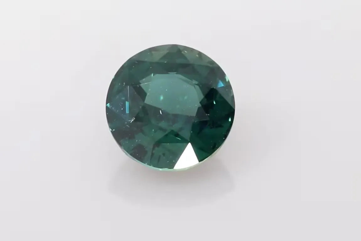 2.60ct Round Natural Sapphire (Colour Bicolor, Clarity Slightly Included, Cut Faceted)