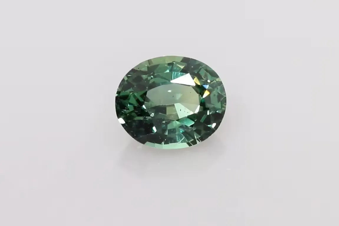 1.53ct Oval Natural Sapphire (Colour Multicolor, Clarity Slightly Included, Cut Faceted)