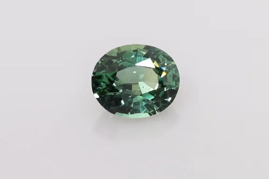 1.53ct Oval Natural Sapphire (Colour Multicolor, Clarity Slightly Included, Cut Faceted)