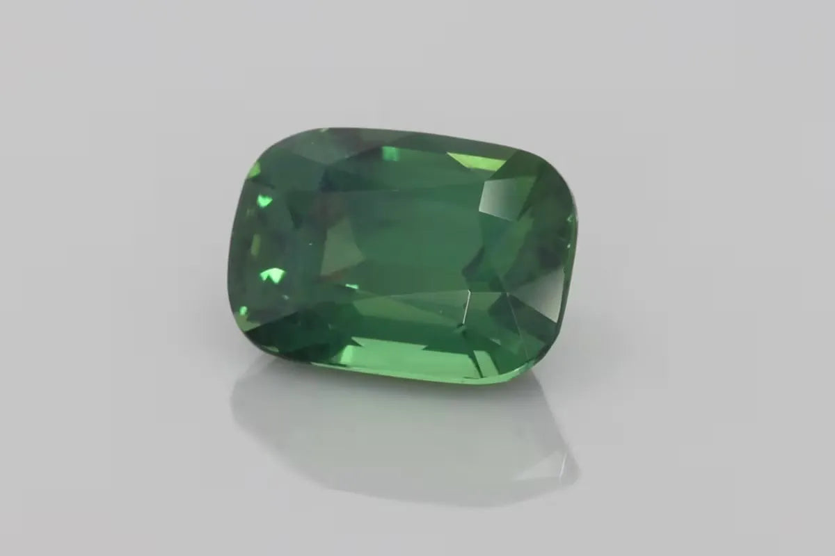 4.01ct Cushion Natural Sapphire (Colour Green, Clarity Slightly Included, Cut Faceted)