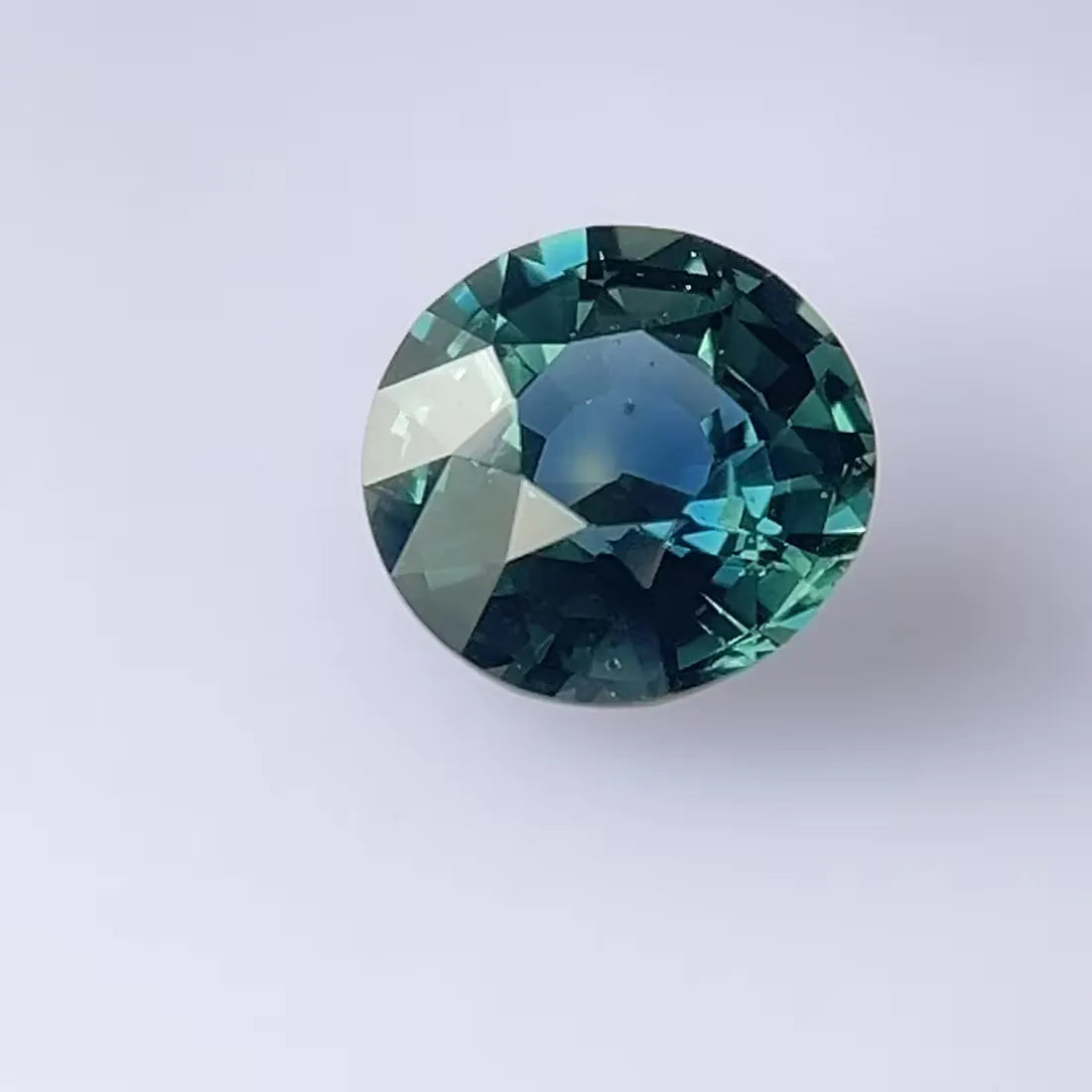 3.57ct Round Natural Sapphire (Colour Multicolor, Clarity Slightly Included, Cut Faceted)