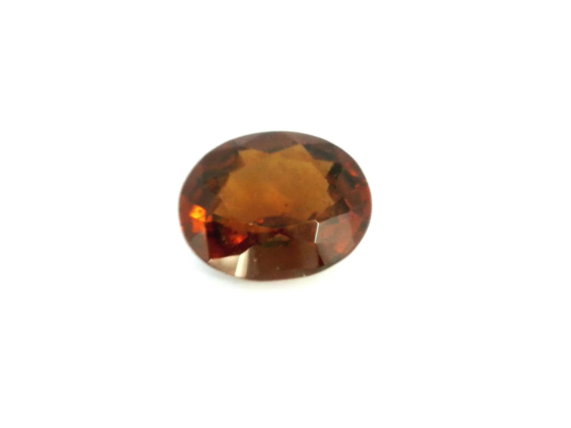 5.31ct Oval Natural Garnet (Colour Orange, Clarity Slightly Included, Cut Faceted)