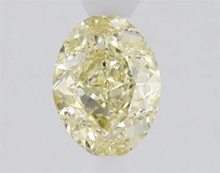 0.81ct Oval Natural Diamond (Colour Fancy Light Yellow, Clarity VS2, GIA Certified)