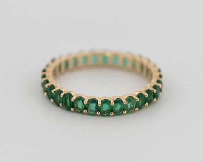1.25ctw Oval Shaped Emerald Lab Grown Eternity Band