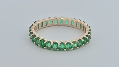 1.25ctw Oval Shaped Emerald Lab Grown Eternity Band